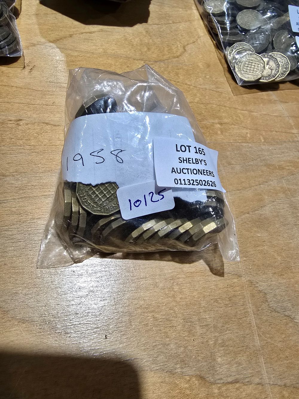 Lot 165: 1 X BAG CONTAINING 1958 THREE PENNY PIECES