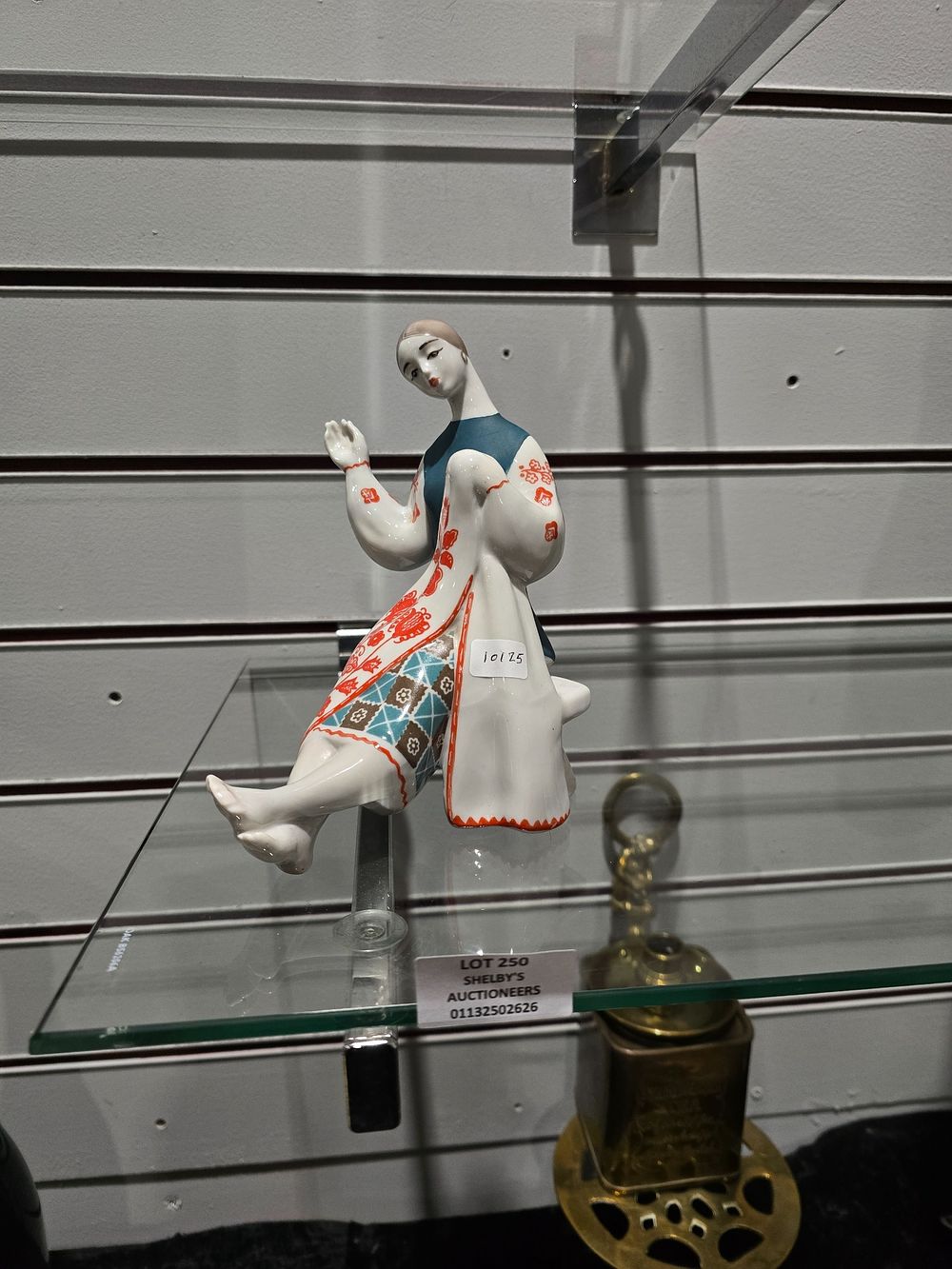 Lot 250: 1 X MADE IN RUSSIA LADY FIGURINE