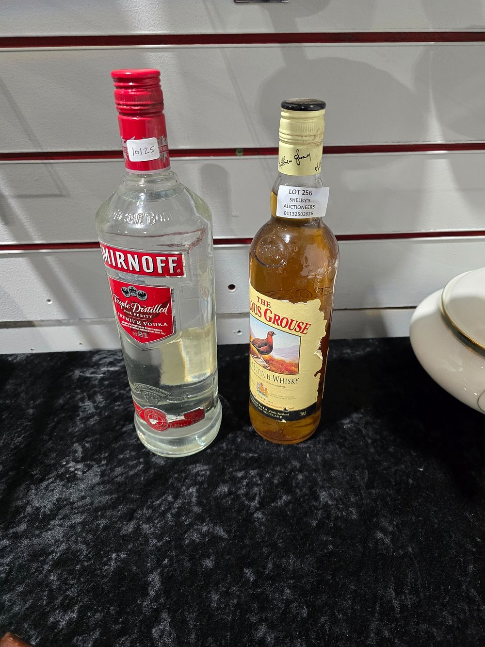 Lot 256: 1 X BOTTLE OF SMIRNOFF WITH FAMOUS GROUSE...
