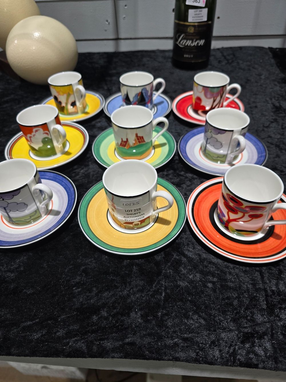Lot 259: 12 WEDGEWOOD CLARICE CLIFF CUPS AND SAUCERS