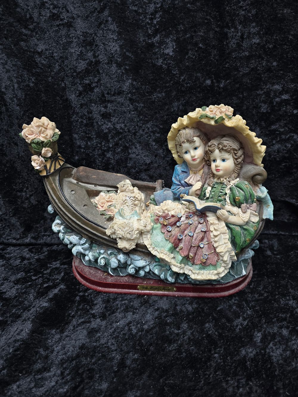 Lot 196: ck collection lady and gent in boat figurine