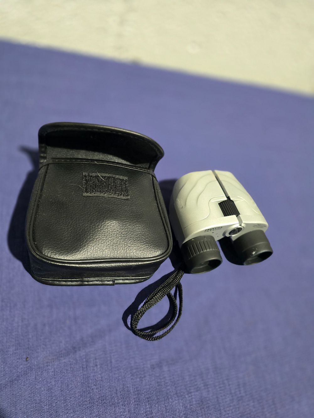 Lot 210: pair of praktica field binnocs 8.21 x 22