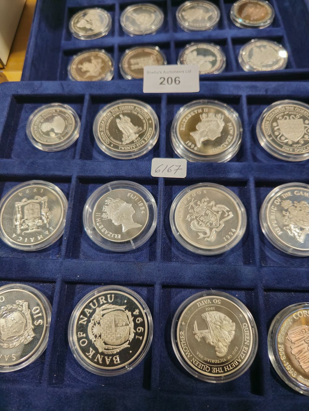 Lot 206: 24 x various silver proof royal family coins queen elizabeth II including turks and caicos lady of the century coins all with certificates