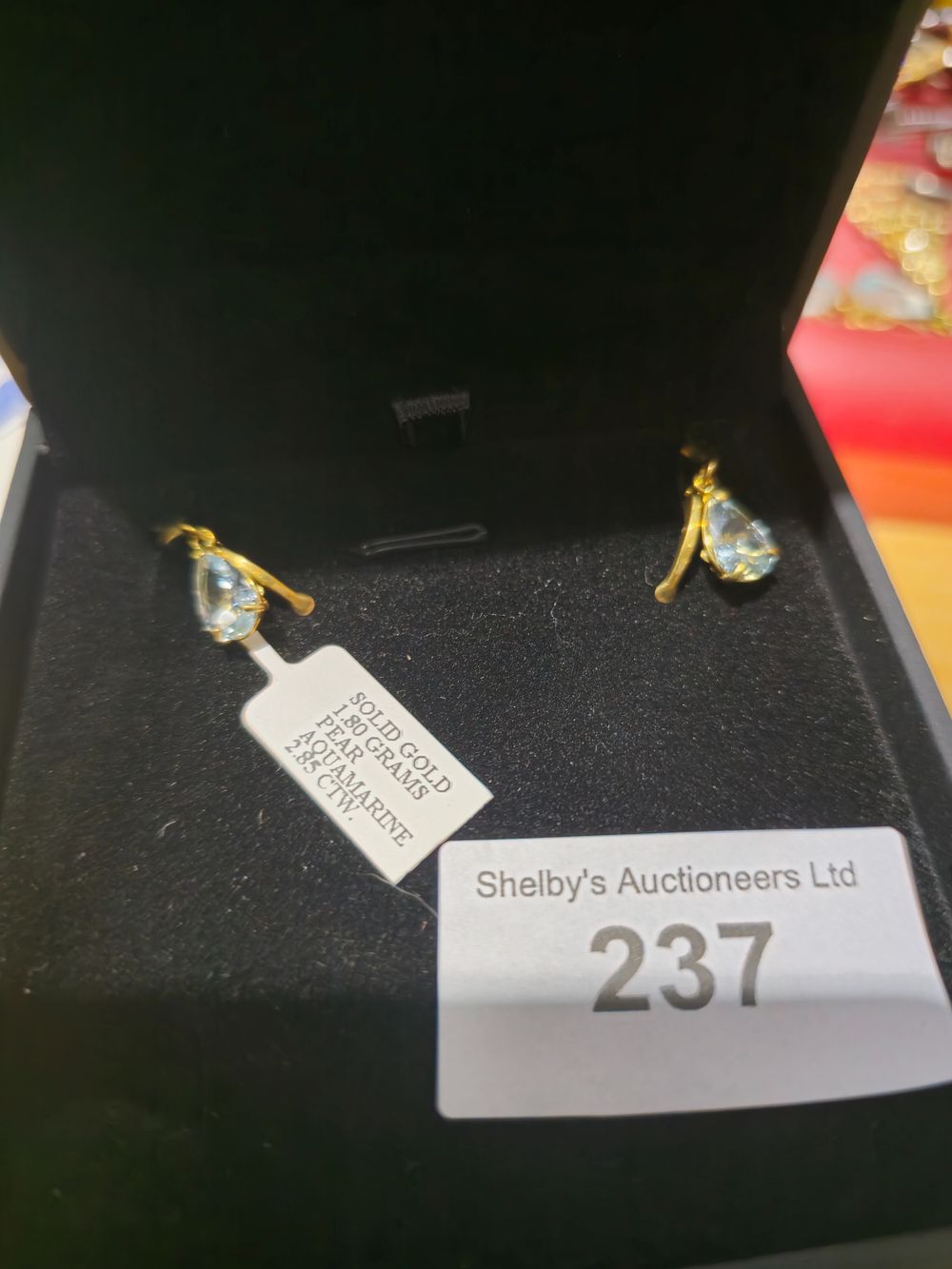 Lot 237: pair of 9k gold pear aqua marine 2.85 ctw earings 1.8 grams of gold