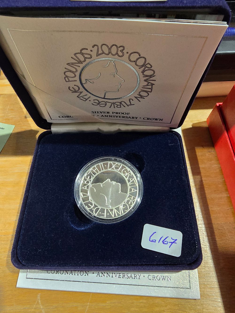 Lot 264: 2003 silver proof £5 coin complete with box no certificate