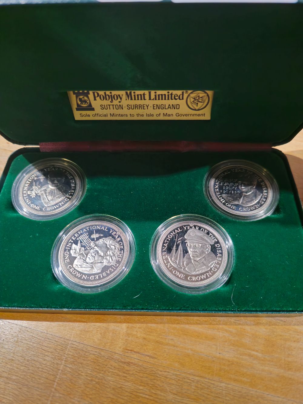 Lot 274: 1981 international of the disabled four crown coin set pobjoy mint