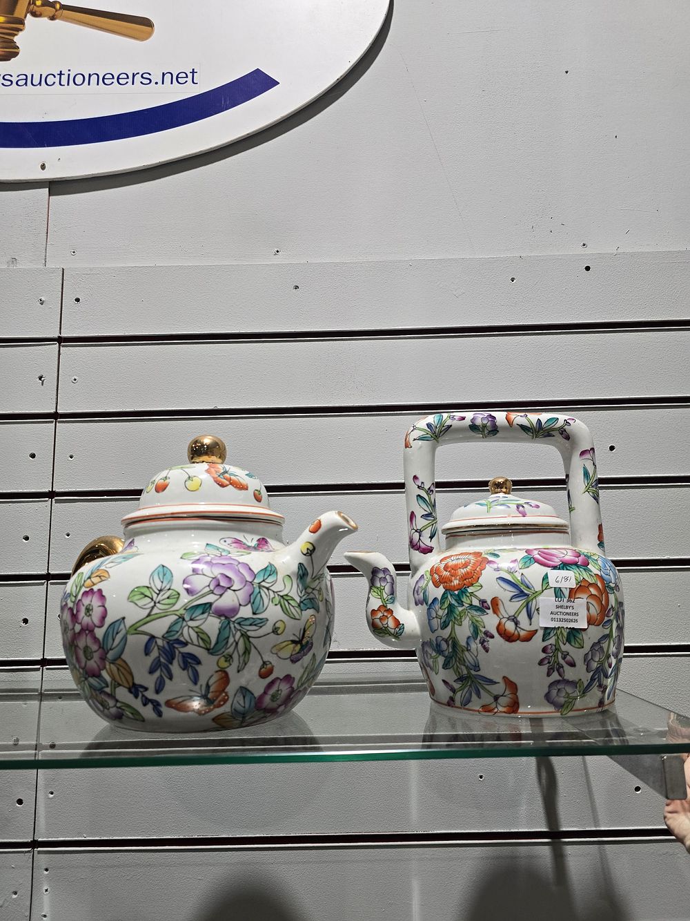 Lot 362: 2 large oriental famile rose pattern tea and water pots