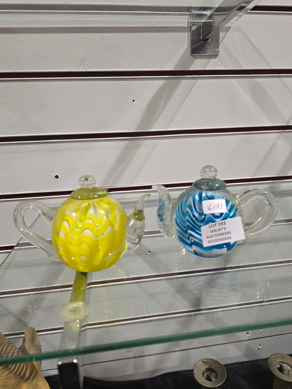 Lot 392: 2 x 1970s glass teapot paper weights
