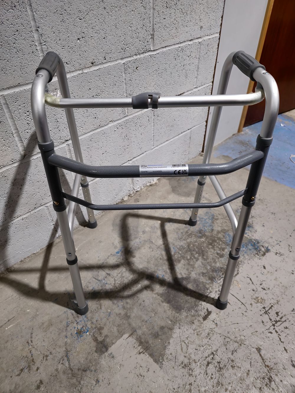 Lot 191: aidapt folding walkin frame