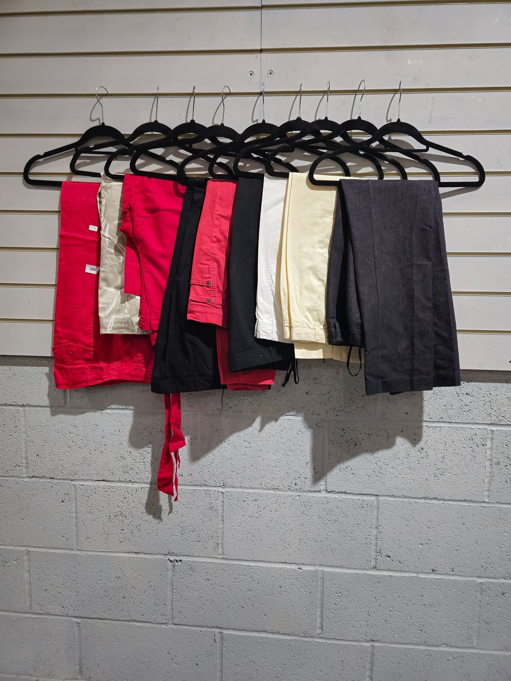 Lot 250: 9 x various pairs of ladies trousers and jeans size 12
