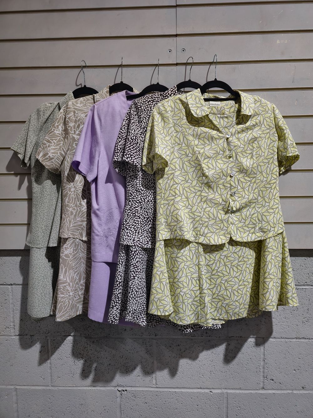 Lot 266: 5 x ladies skirt and top suits size 12