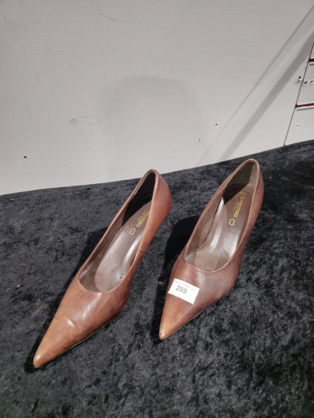 Lot 299: pair of dunnes stores ladies brown leather heels size 39