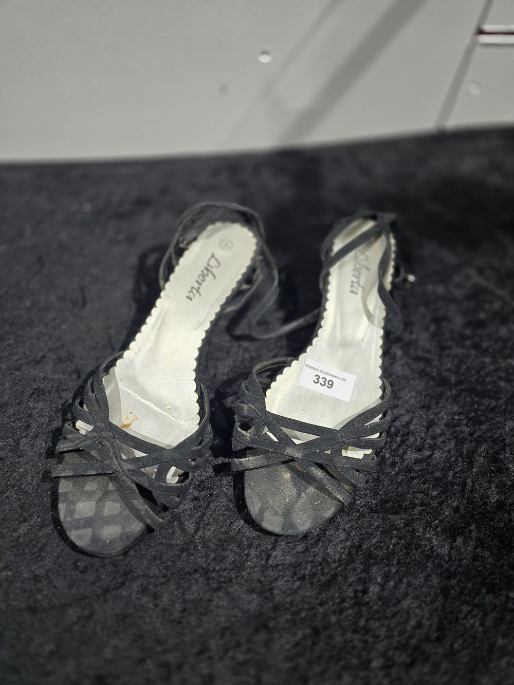 Lot 339: pair of black low heel sandles needs new heel piece