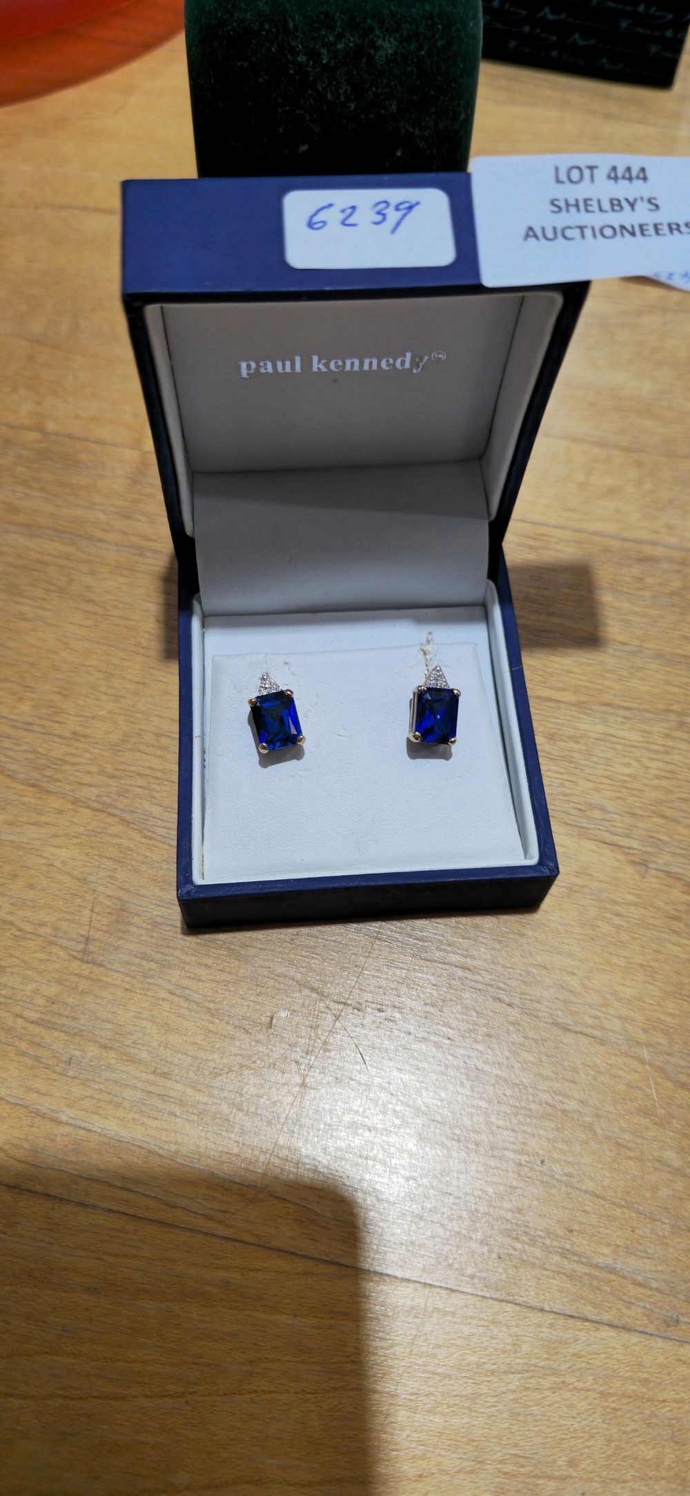 Lot 444: pair of 9ct gold tansanite inset ladies earrings missing one back