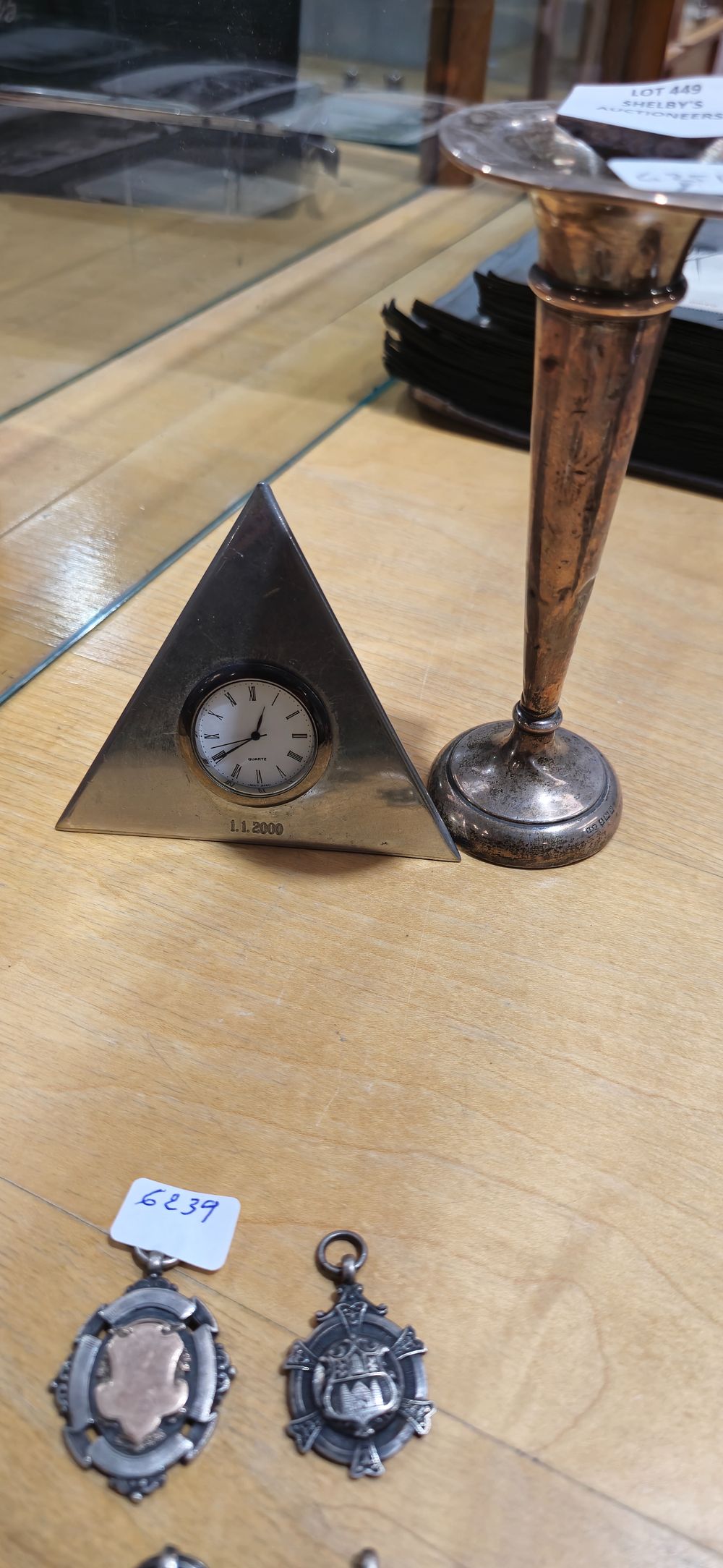 Lot 449: 1 x large silver bud vase with sheffield pewter clock