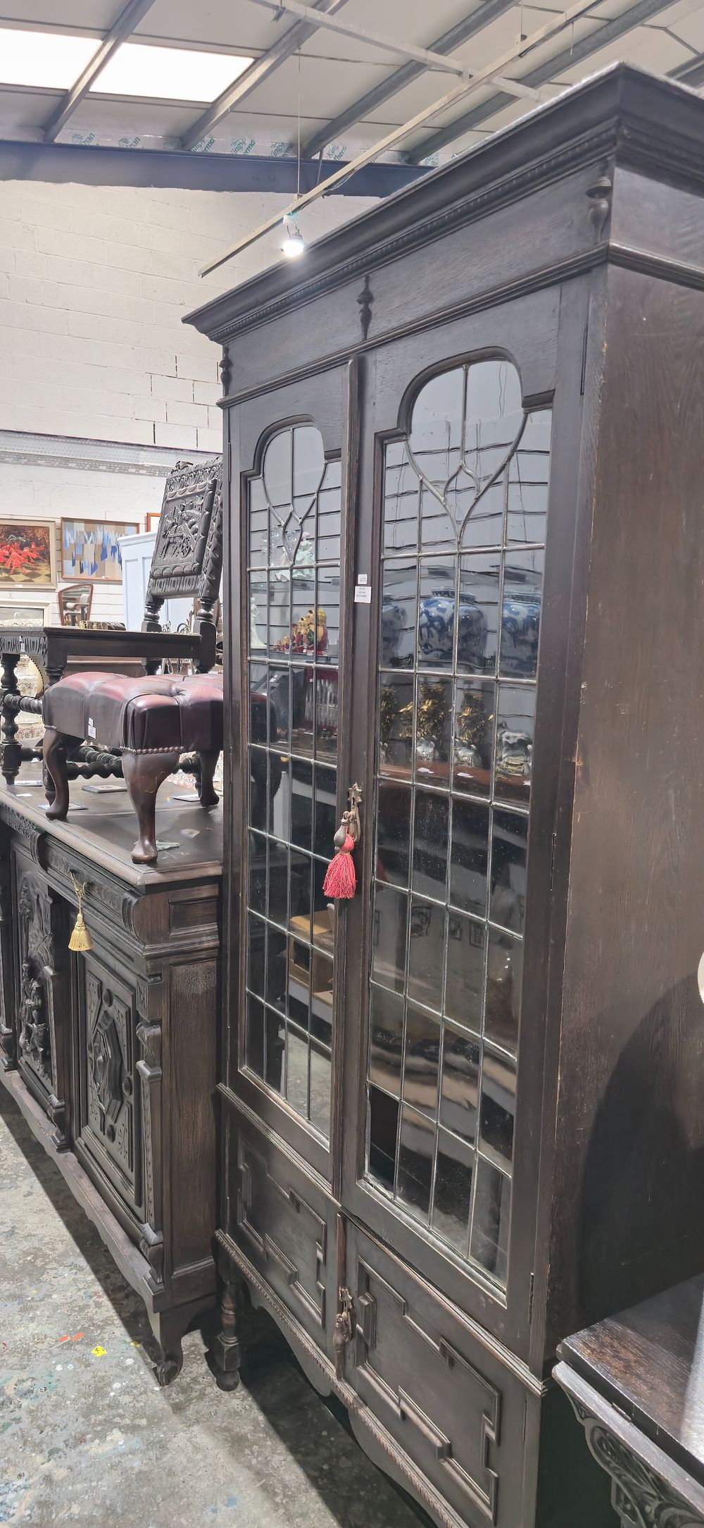 Lot 172: oak edwrdain leaded light bookcase