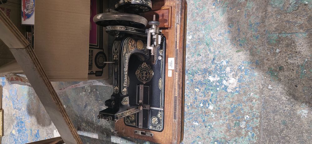 Lot 245: fryster and ross man vintage sewing machine