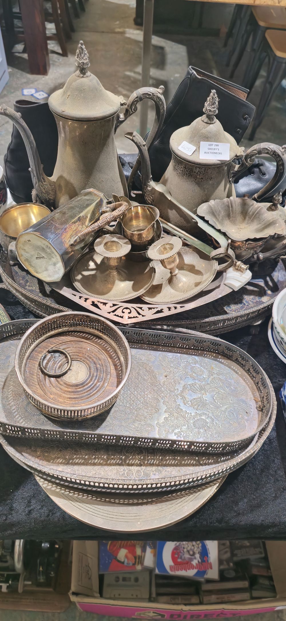 Lot 299: large selection of various silver plated ware items tea pots water jug jugs candle sticks etc
