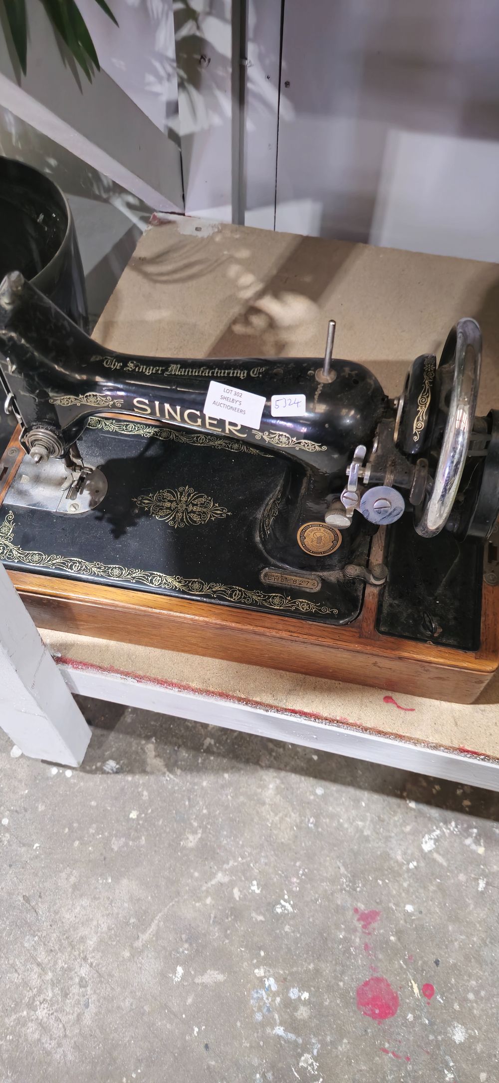 Lot 302: singer hand powered vintage sewing machine