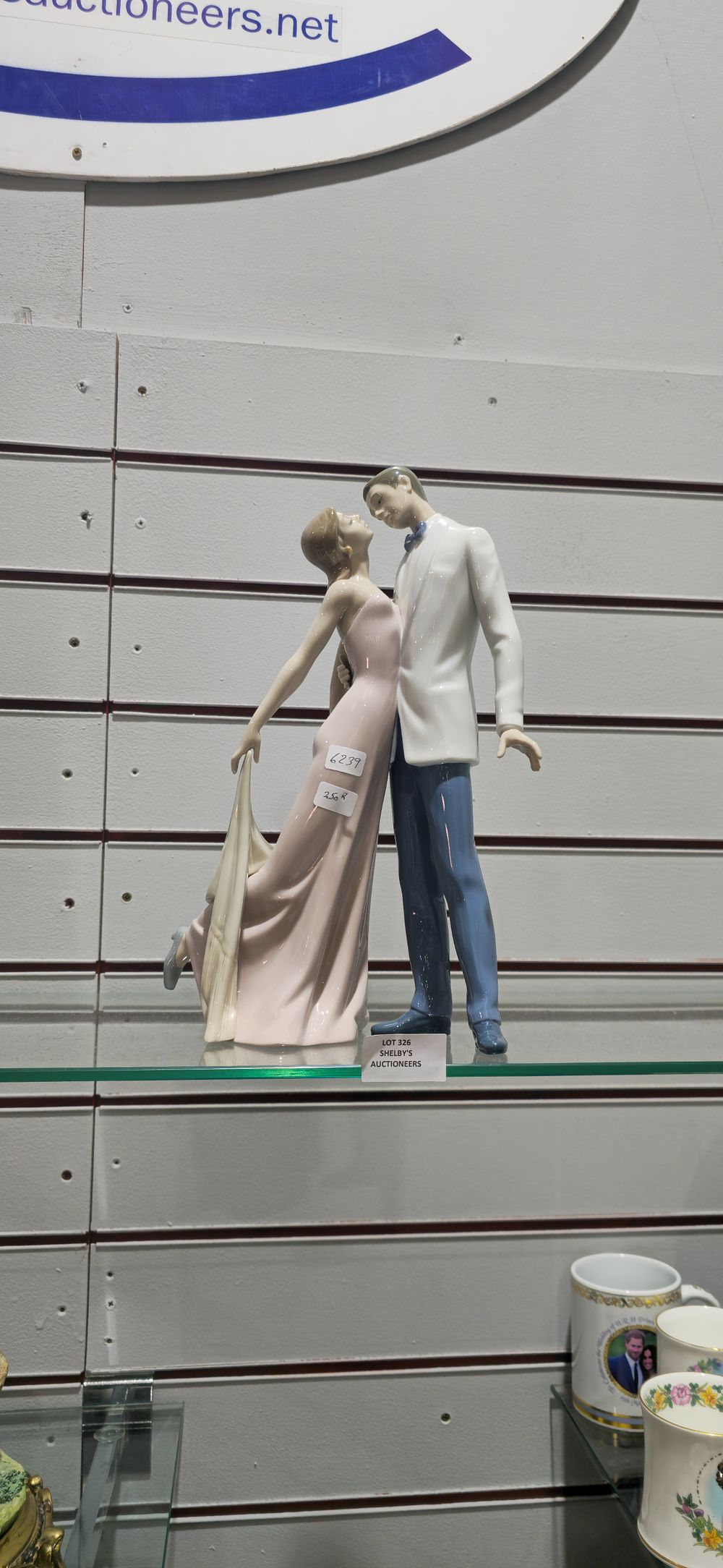 Lot 326: 1 x large lladro 1997 gentleman and lady figurine
