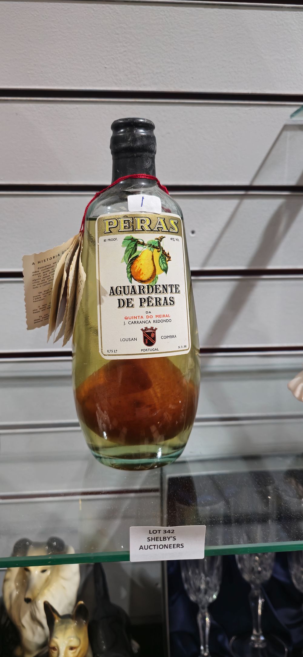 Lot 342: 1 x bottle of peras complete with pear in bottle