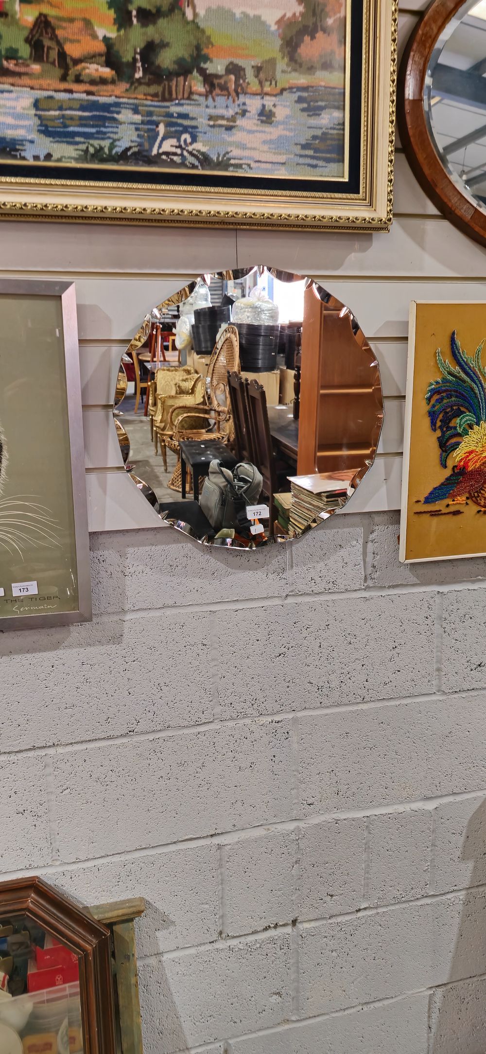 Lot 172: 1950s round wall mirror