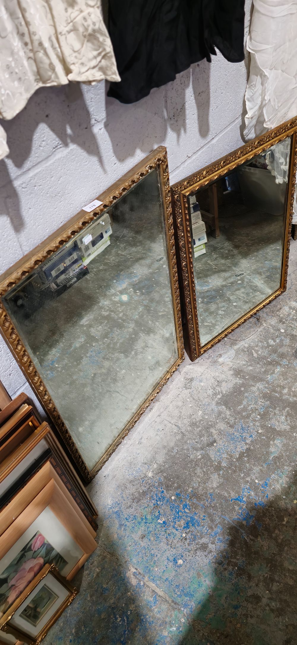 Lot 178: 2 x heavy wooden gilt framed hall mirrors