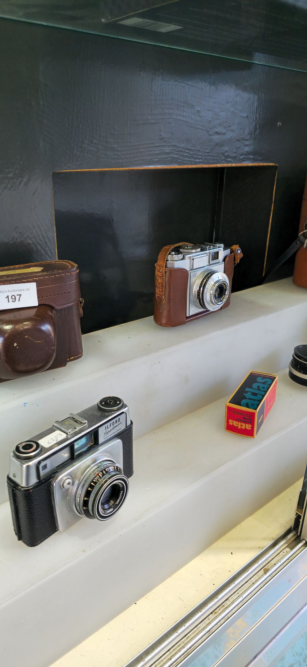 Lot 197: ilford sportsman camera with zeiss ikon camera lenses etc