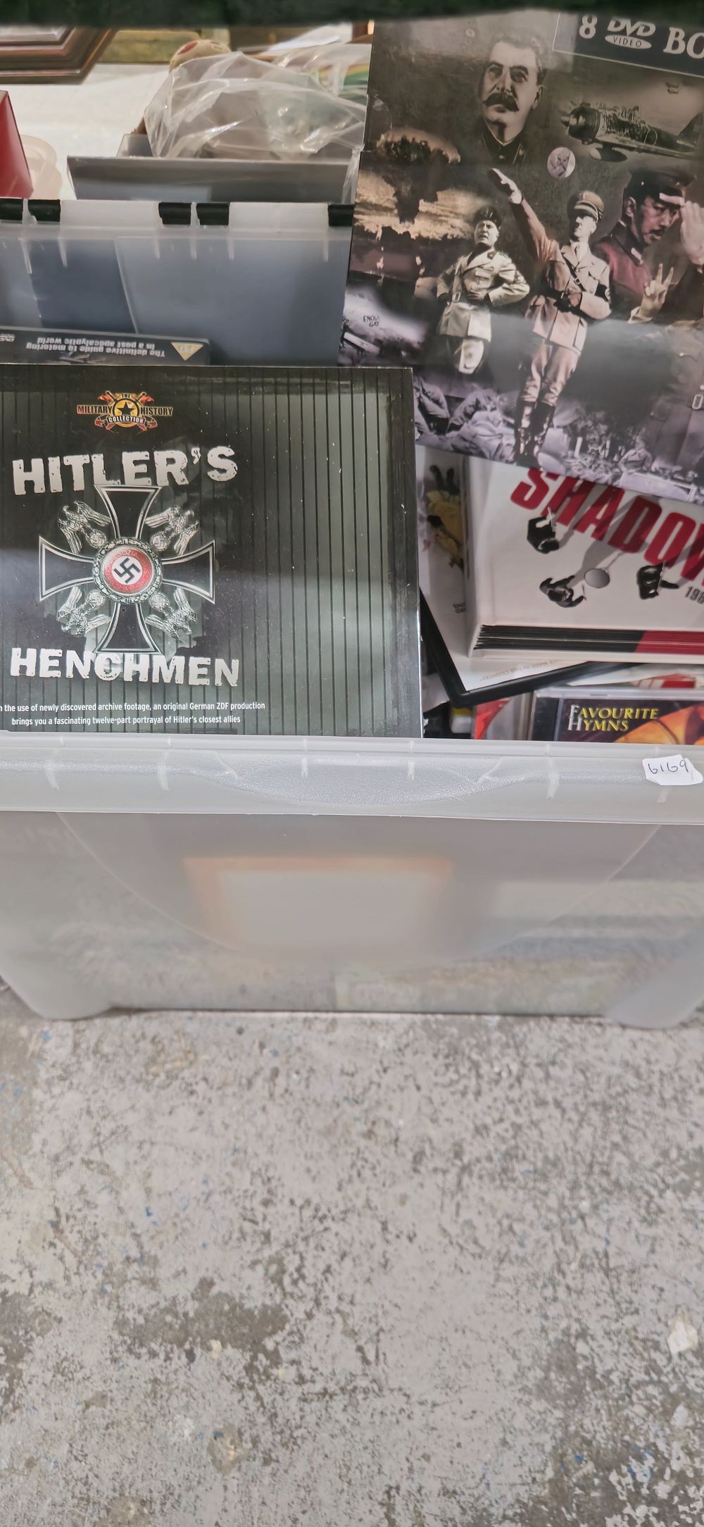 Lot 303: 1 x box of various dvds and cds