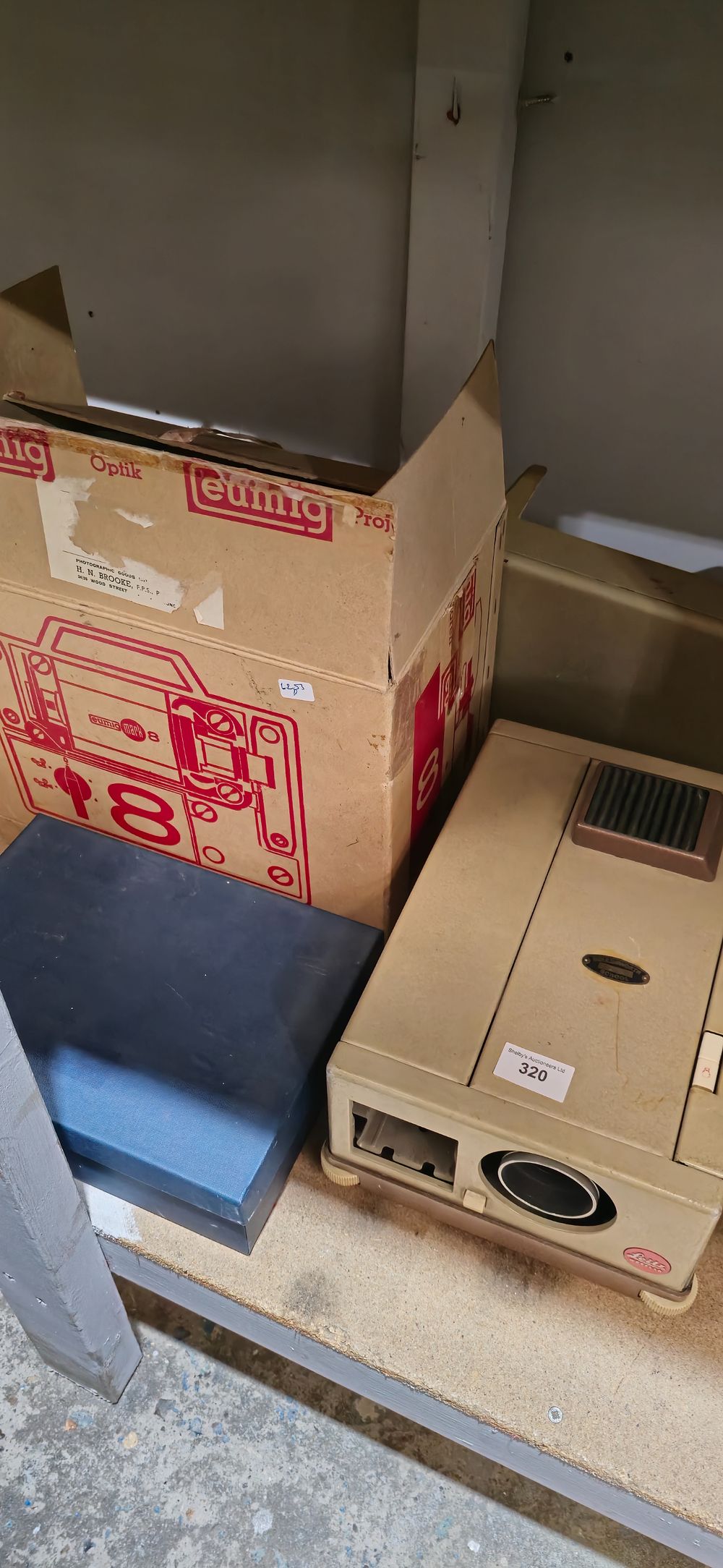 Lot 320: leitz vintage projector eith boxed eumig projector