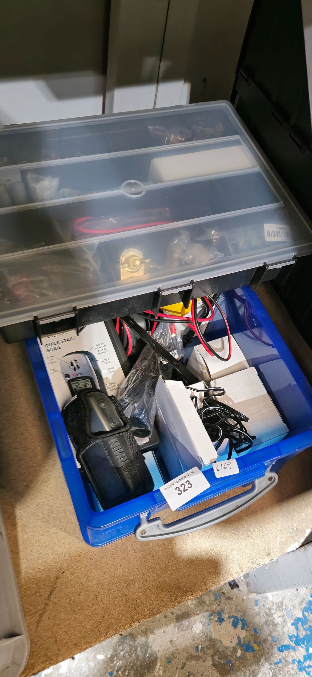 Lot 323: box containing garmin etrex electricity testing items etc