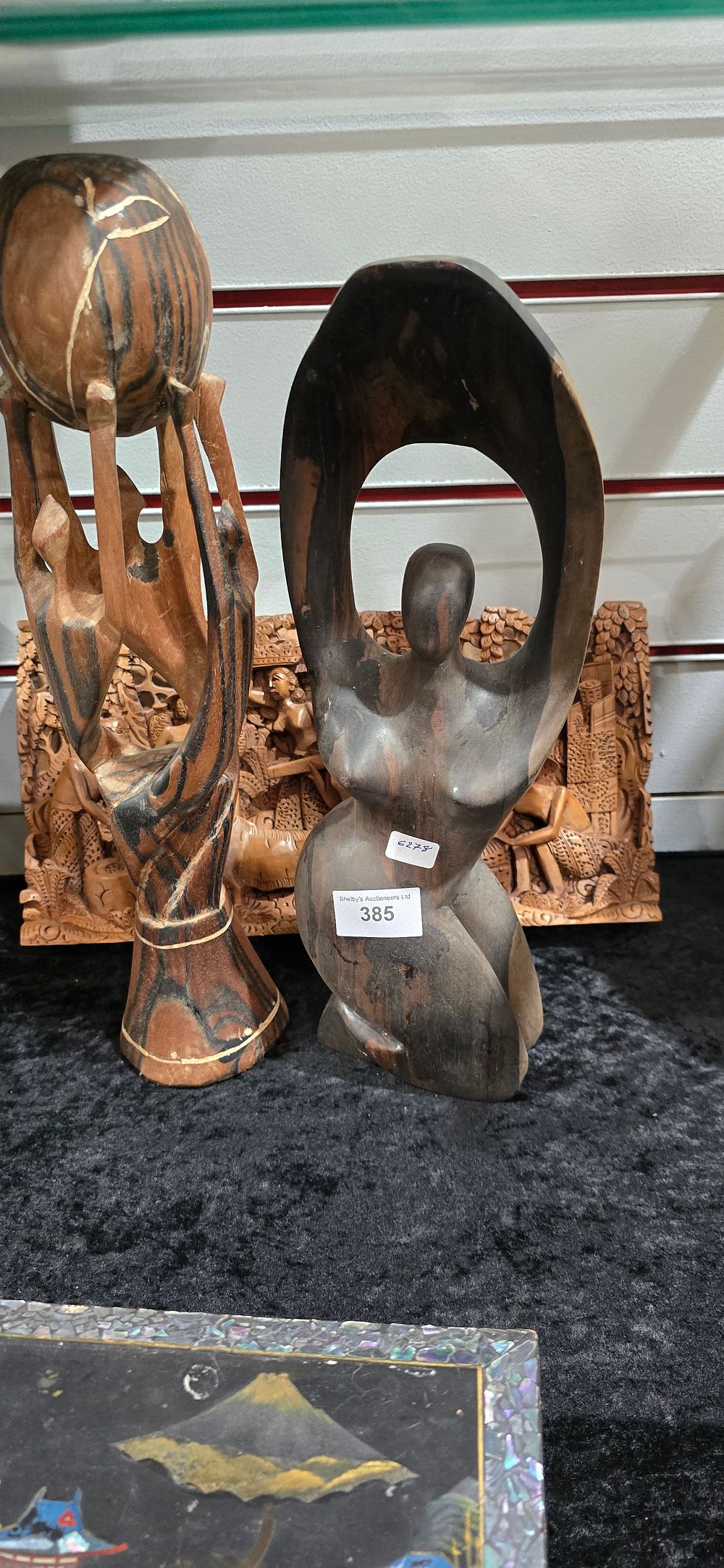 Lot 385: 2 x wooden african figures with carved detail oriental wall plaque