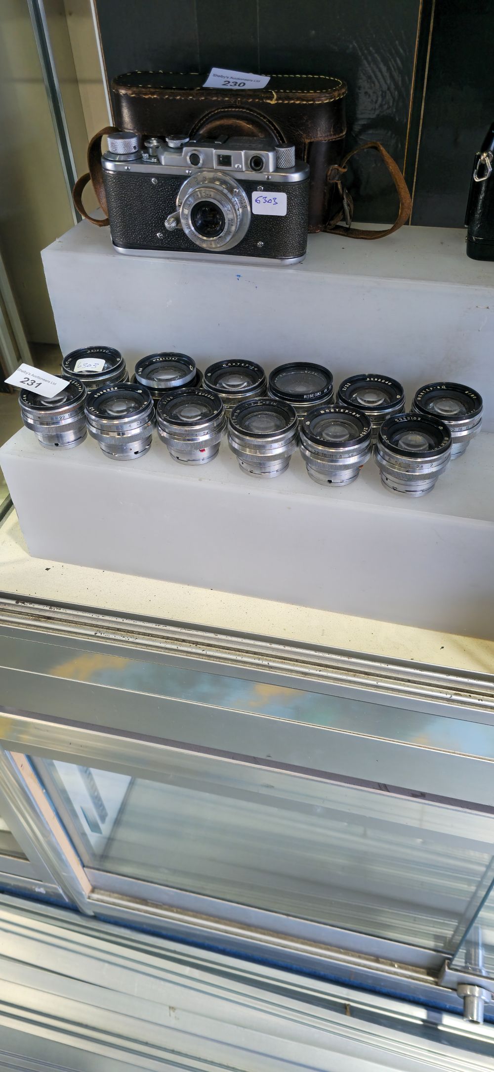 Lot 231: 12 x various vintage metal camera lenses