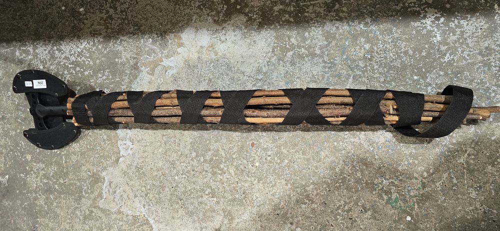 Lot 296: unite m48 wood axe with axe cover