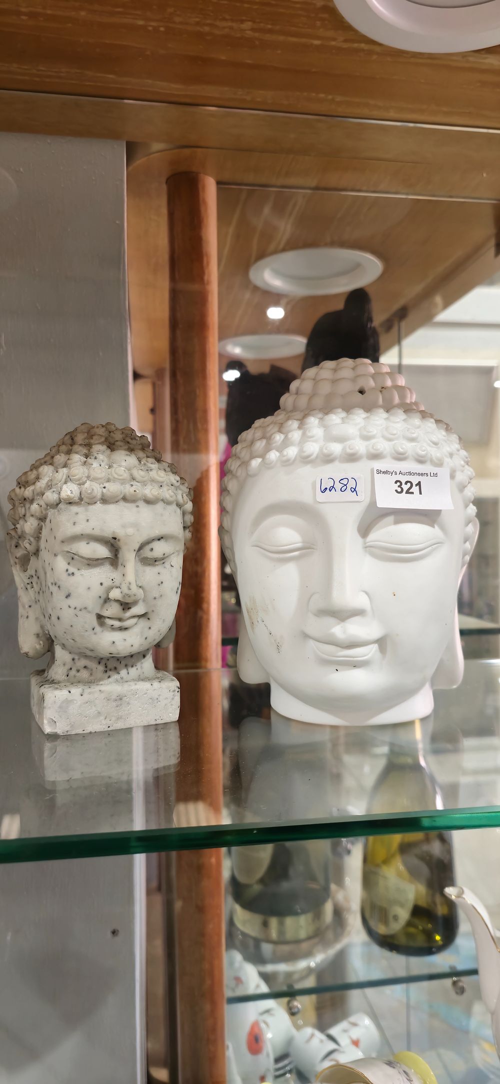 Lot 321: 2 x various style buddah heads