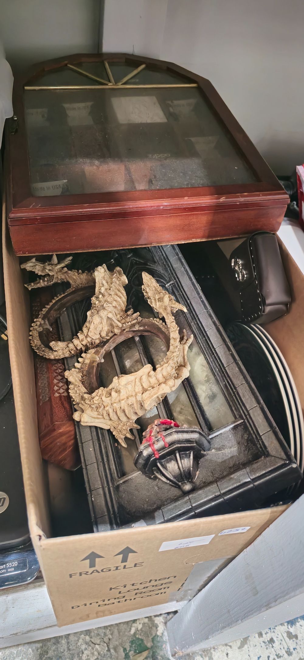 Lot 406: box containing zippo lighter display case with small leather cases etc