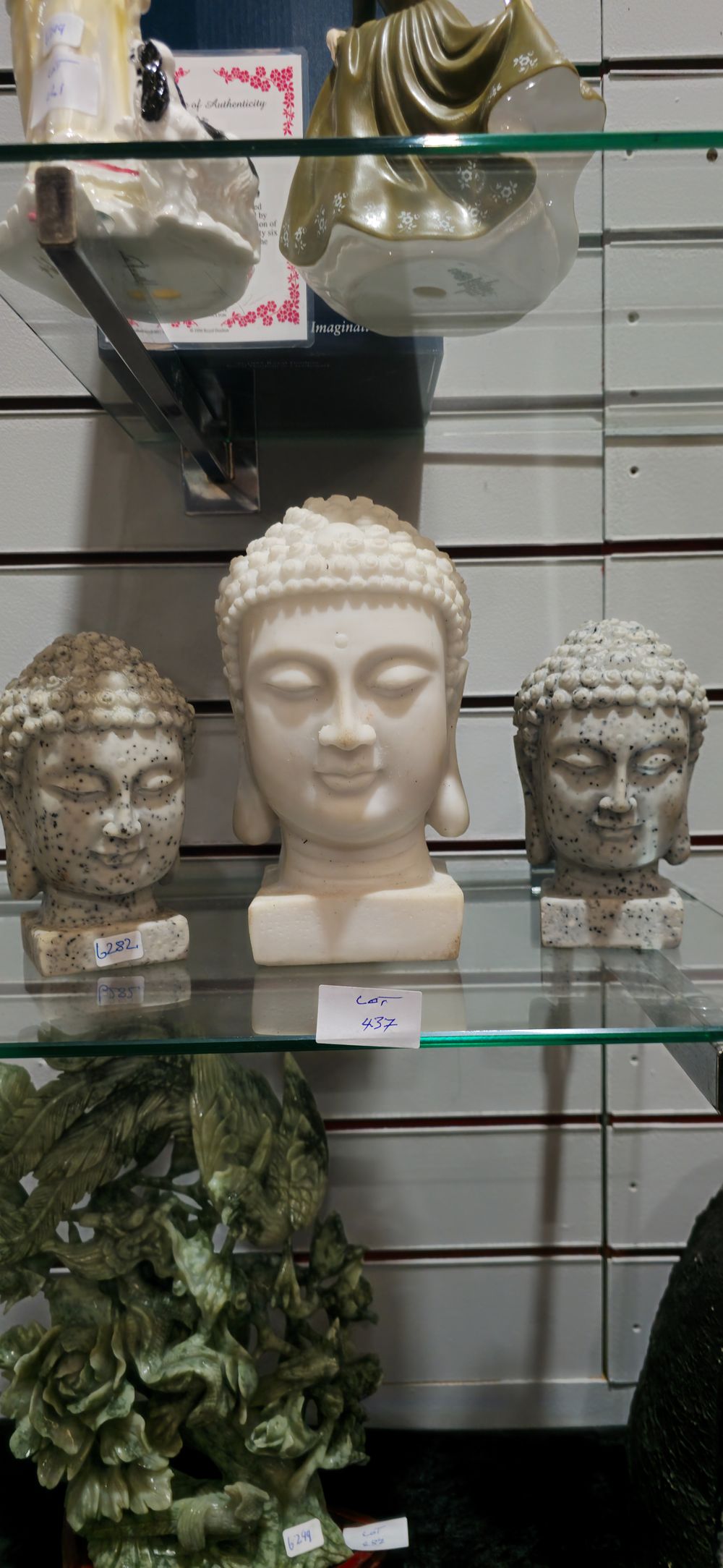 Lot 437: 3 various agate style buddah heads