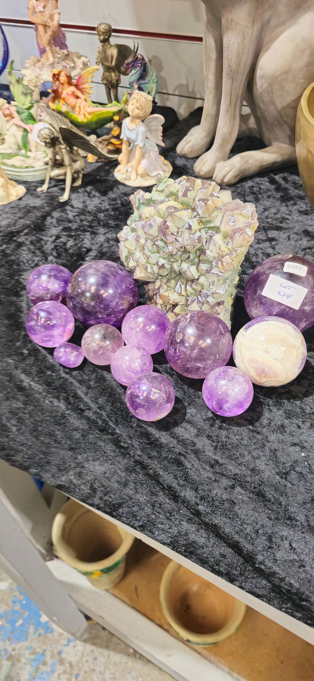 Lot 478: selection of amethyst spheres with amethyst geode