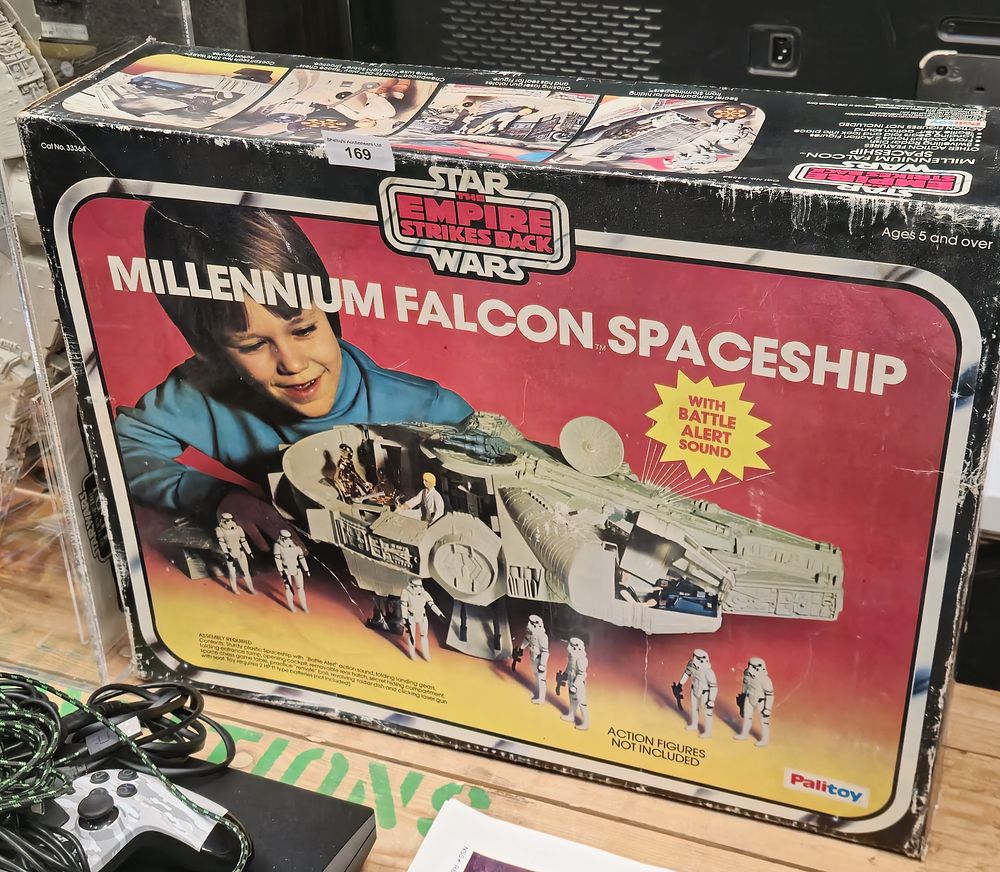Lot 169: starwars empire strikes back boxed millenium falcon space ship
