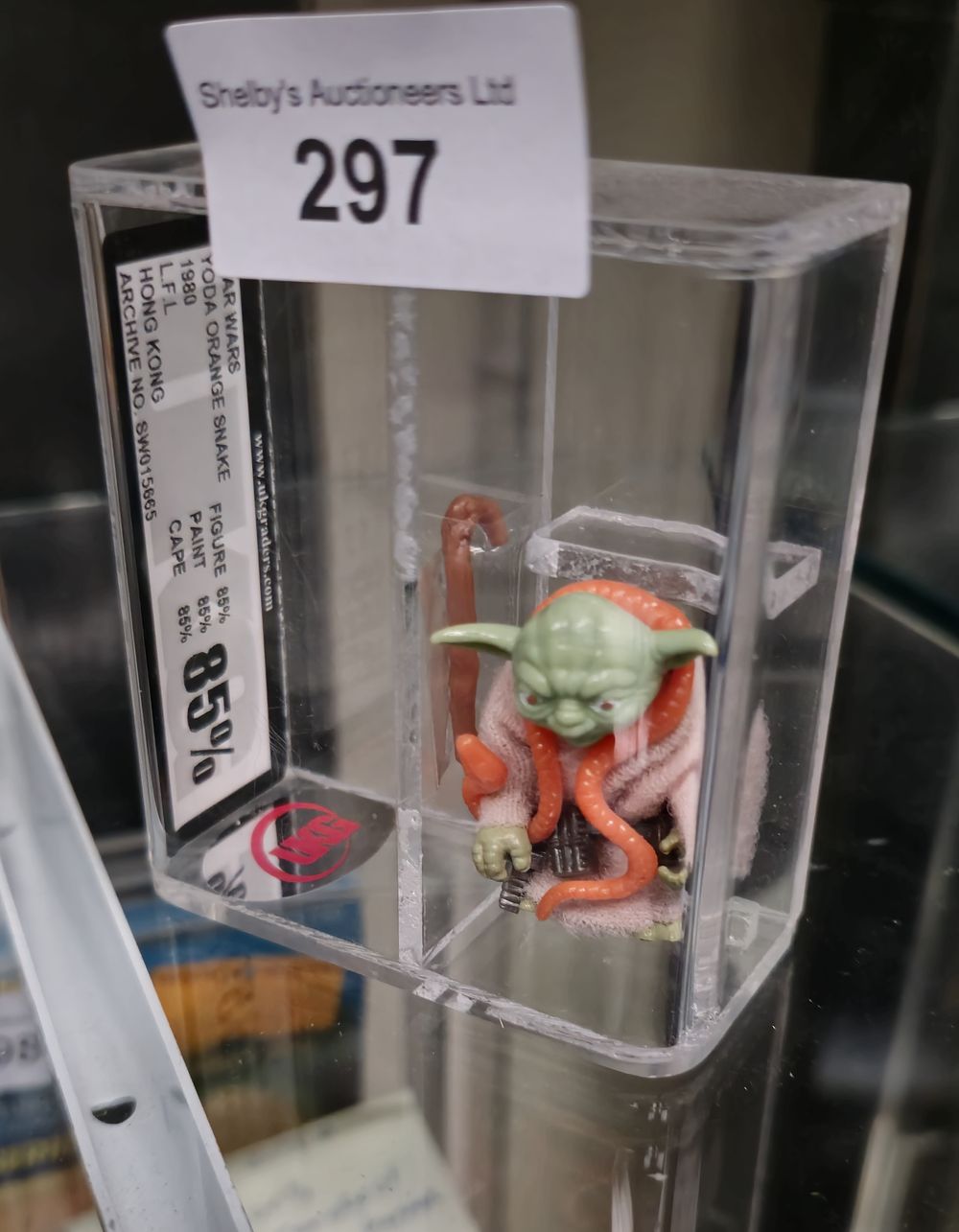Lot 297: ukg starwars graded figure yoda orange snake 85%