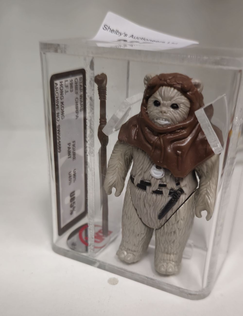 Lot 153: UKG Star Wars graded figure chief chirpa 85%...