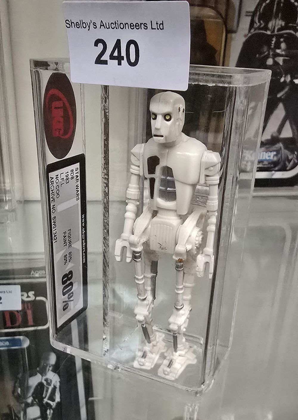 Lot 166: UKG Star Wars graded figure 8d8 droid 80%...