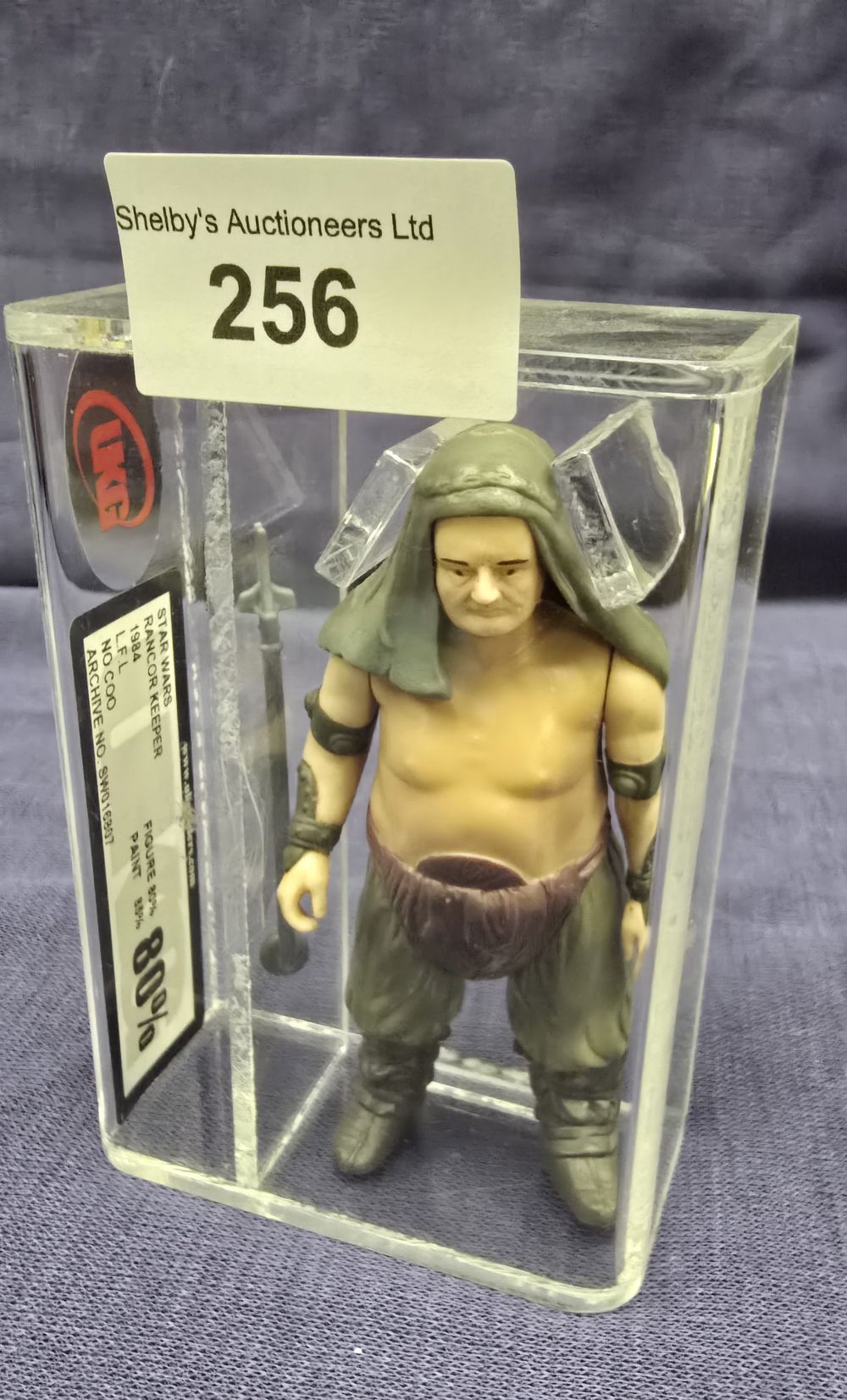 Lot 182: UKG Star Wars graded figure rancore keeper 80%