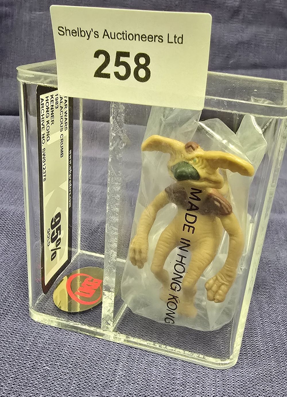 Lot 184: UKG Star Wars graded figure salacious crum 95%