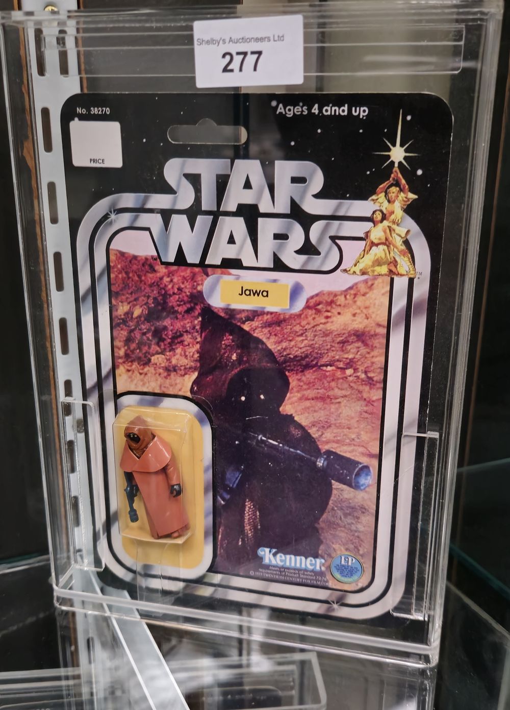 Lot 203: Star Wars vinyl jawa reproduction carded by Kenner