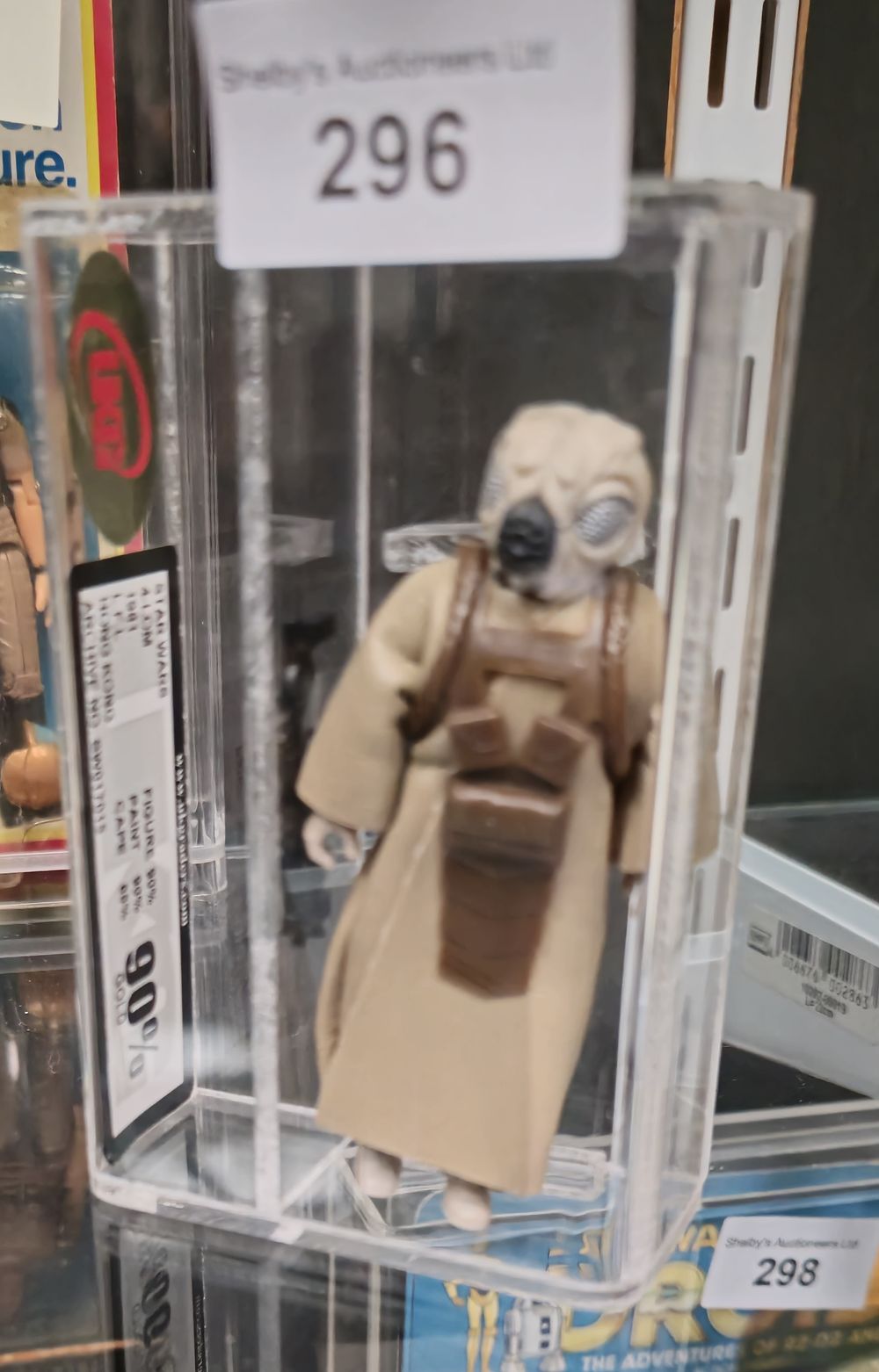 Lot 223: UKG Star Wars graded figure 4-lom 90%