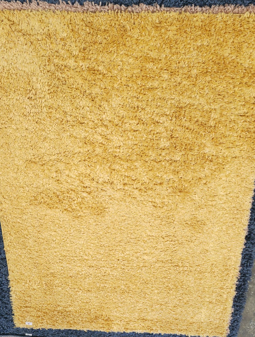 Lot 313: large yellow chenille floor rug new condition 67x48