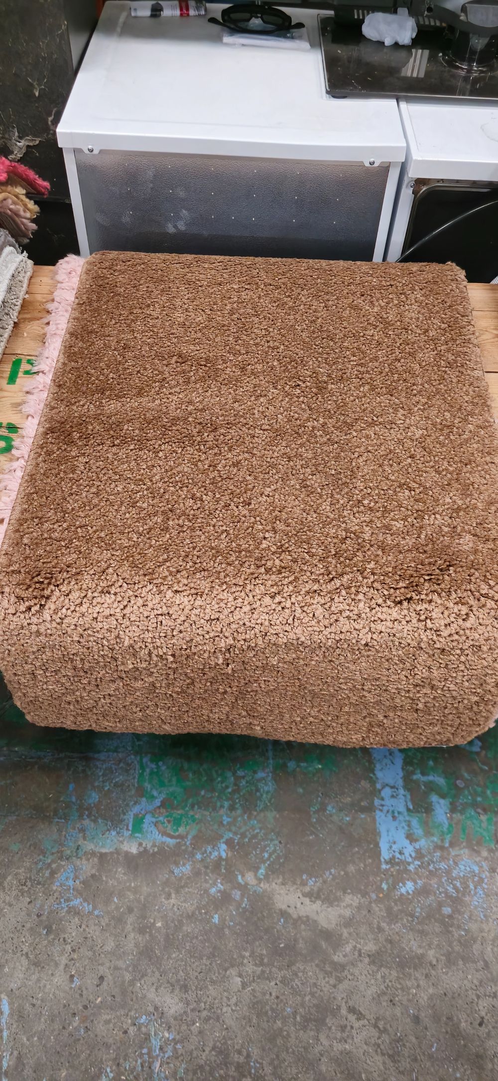Lot 441: dark beige small rubber backed new rug 44 x 24