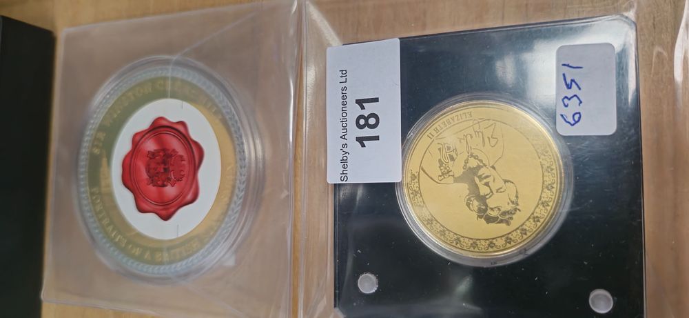 Lot 181: 2 x windsor mint sealed lrge coins churchill and elizabeth II