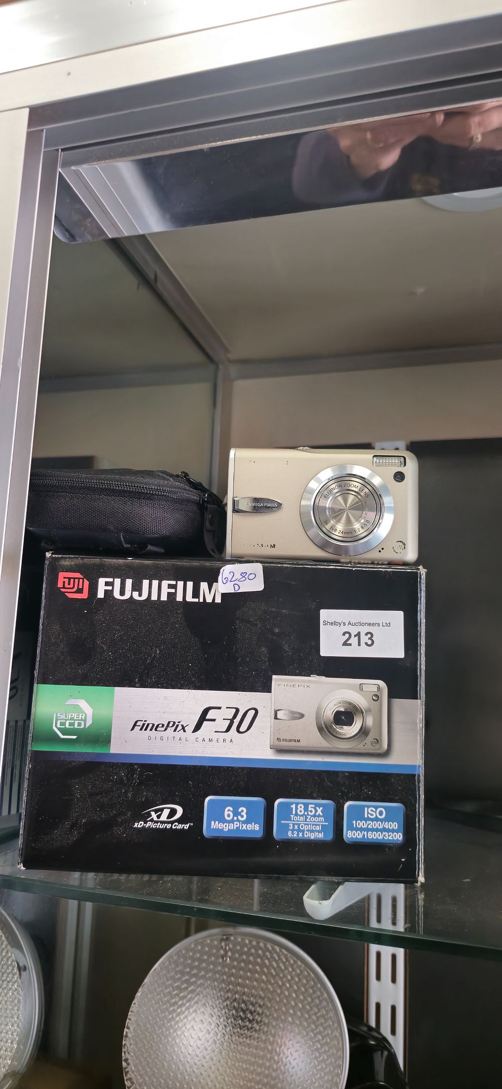 Lot 213: fuji film f30 fine pix camera complete in box